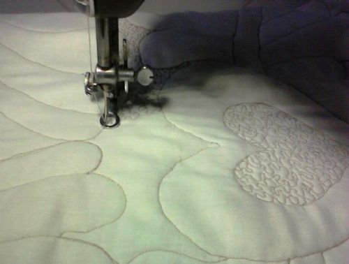Cobertor patchwork, detall de la confecció i costura